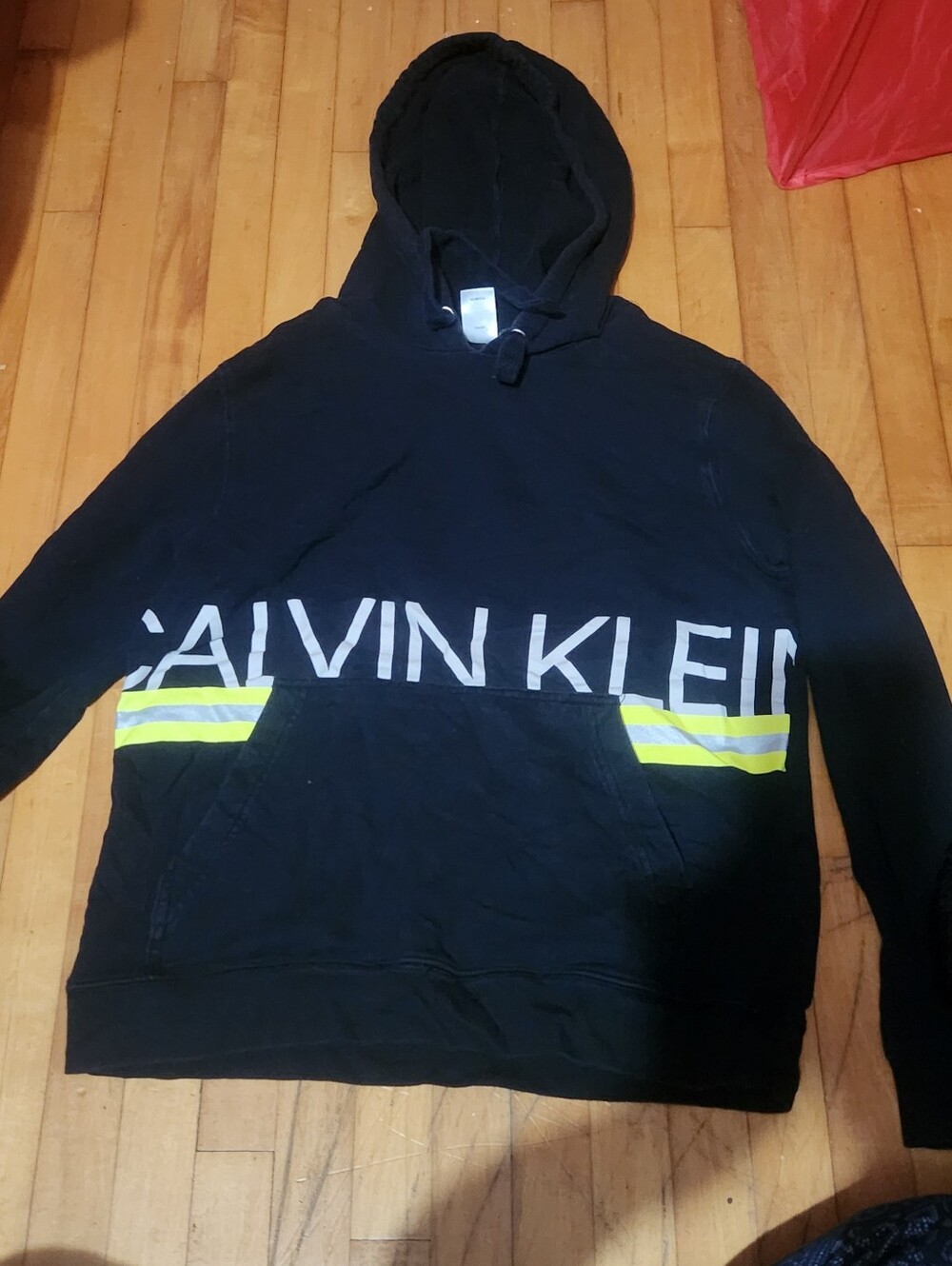 Calvin Klein Black Hoodie with White Logo and Yellow Stripes